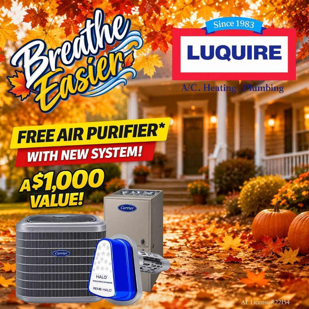 Breathe Easier advertisement for Luquire A/C, Heating, and Plumbing, featuring a free air purifier with a new system purchase, valued at $1,000, set against an autumn backdrop.
